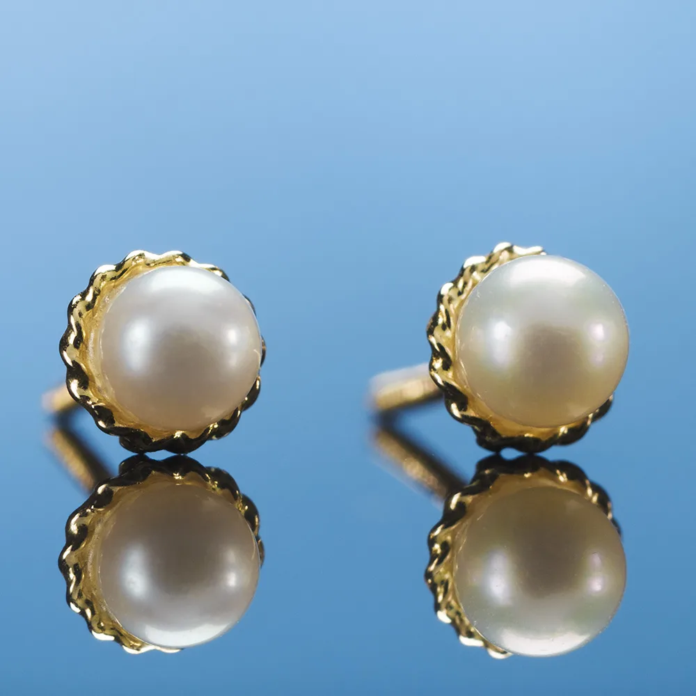Baby jewelry in 18k gold with pearls — Joyería Liévano