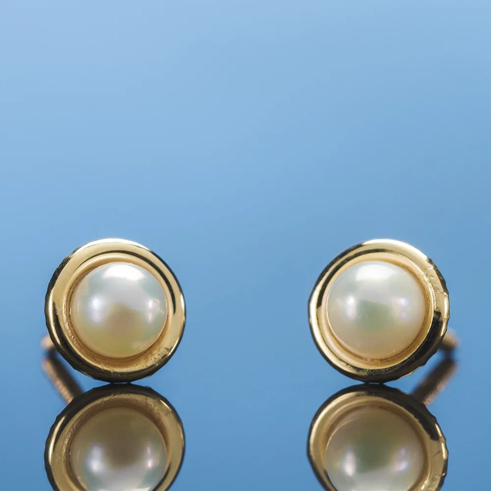 Baby jewelry in 18k gold with pearls — Joyería Liévano