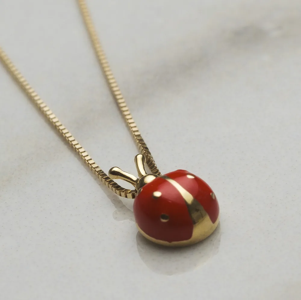 Baby jewelry in 18k gold — Joyería Liévano