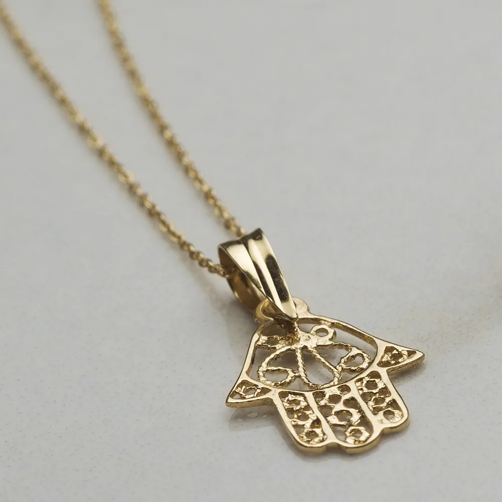 Baby jewelry in 18k gold — Joyería Liévano