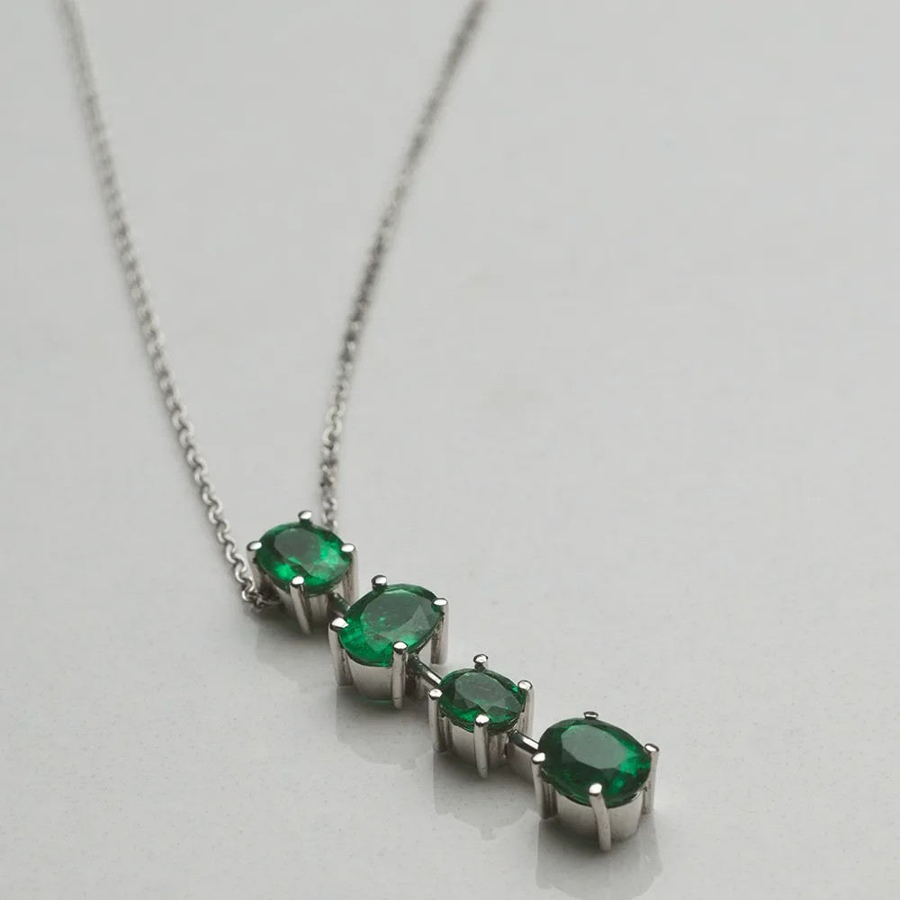 Pendant with emeralds in 18k gold — Joyería Liévano