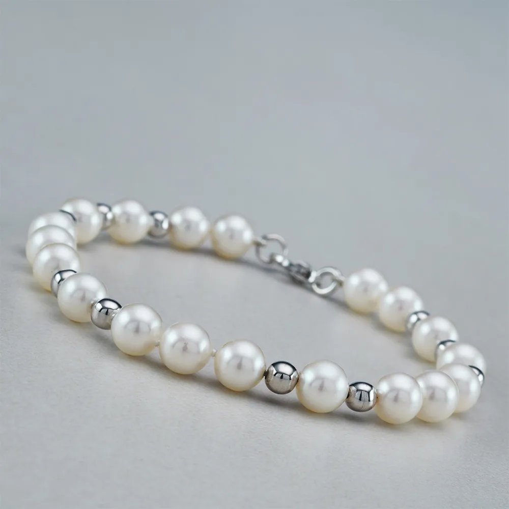 Bracelet with pearls in 18k gold — Joyería Liévano