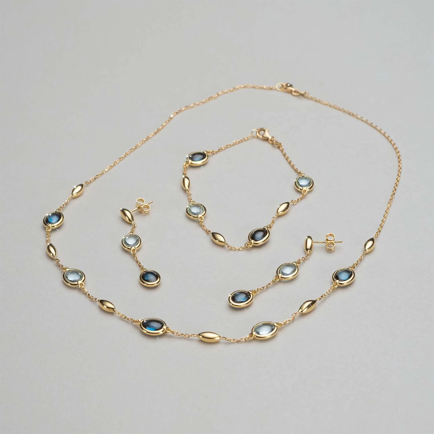 Piece with colored gemstones in 18k gold — Joyería Liévano