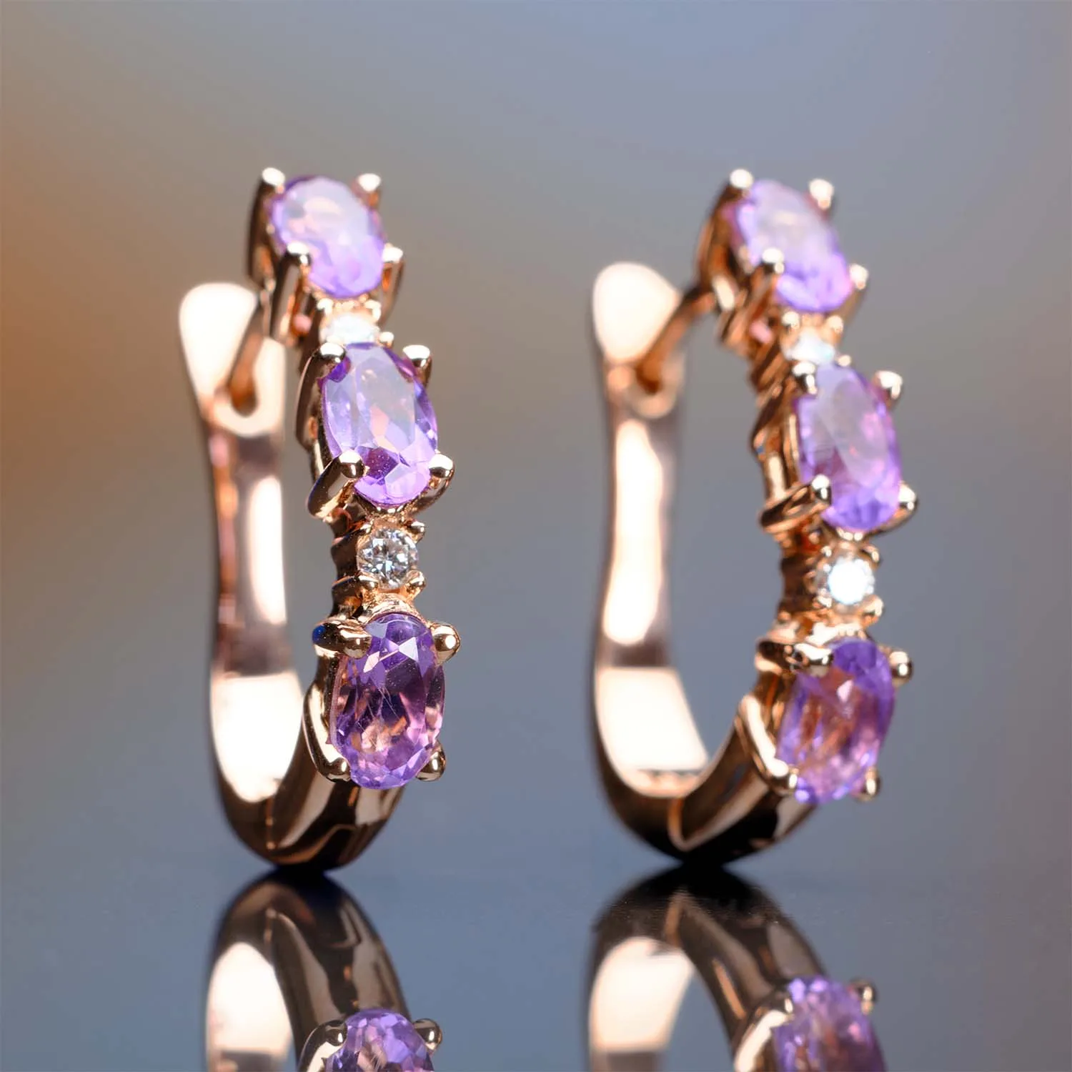 Earrings with colored gemstones in 18k gold — Joyería Liévano