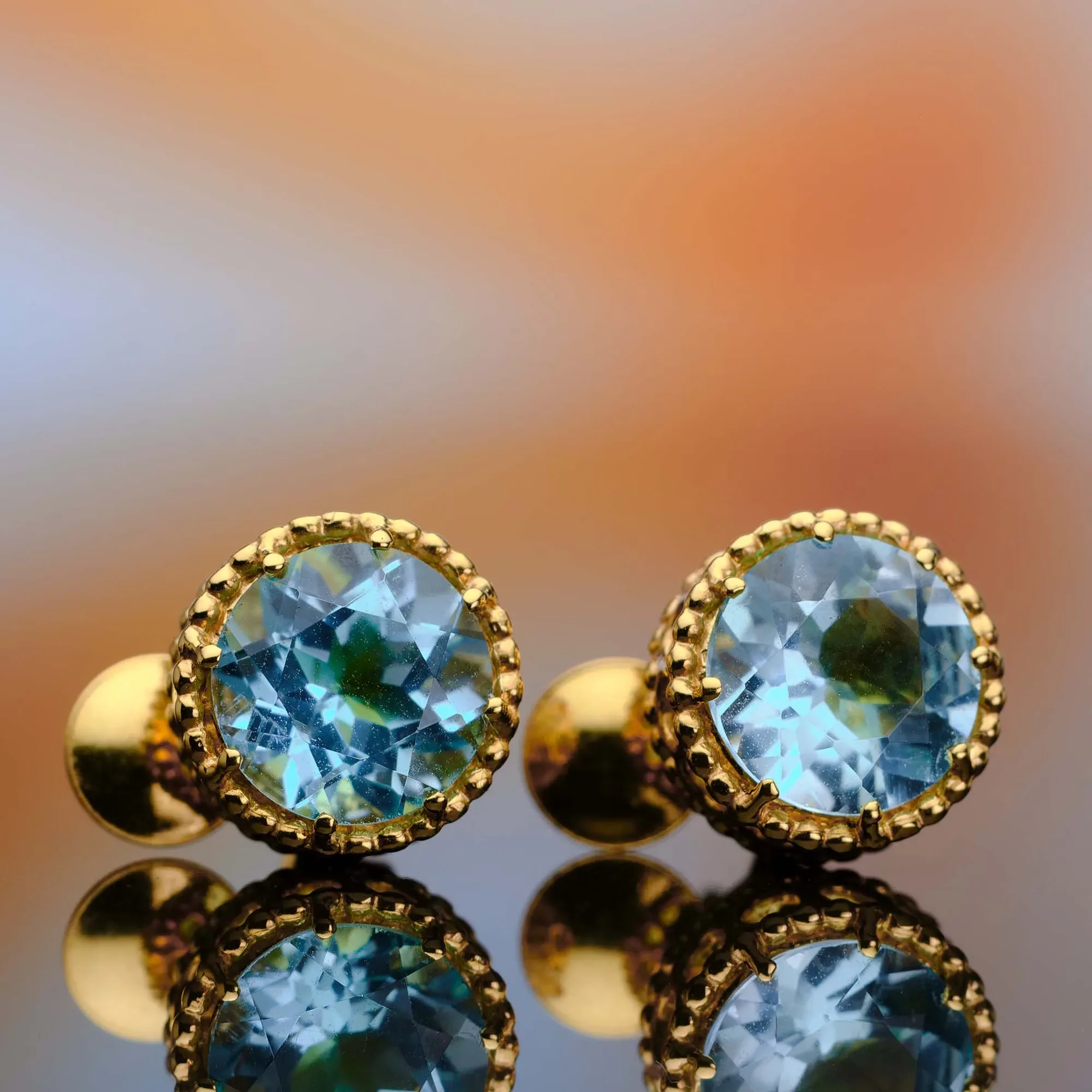 Earrings with colored gemstones in 18k gold — Joyería Liévano