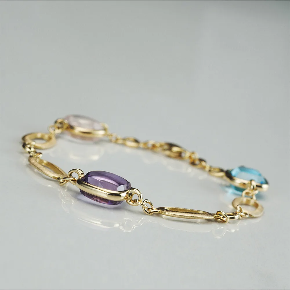 Bracelet with colored gemstones in 18k gold — Joyería Liévano