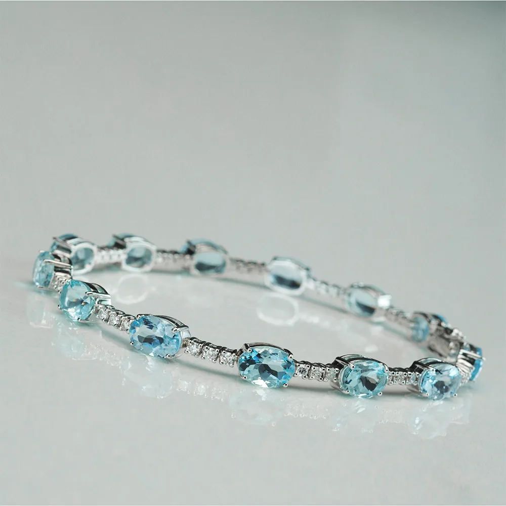 Bracelet with colored gemstones in 18k gold — Joyería Liévano
