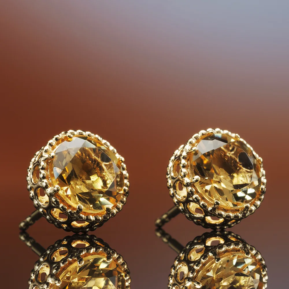 Earrings with colored gemstones in 18k gold — Joyería Liévano