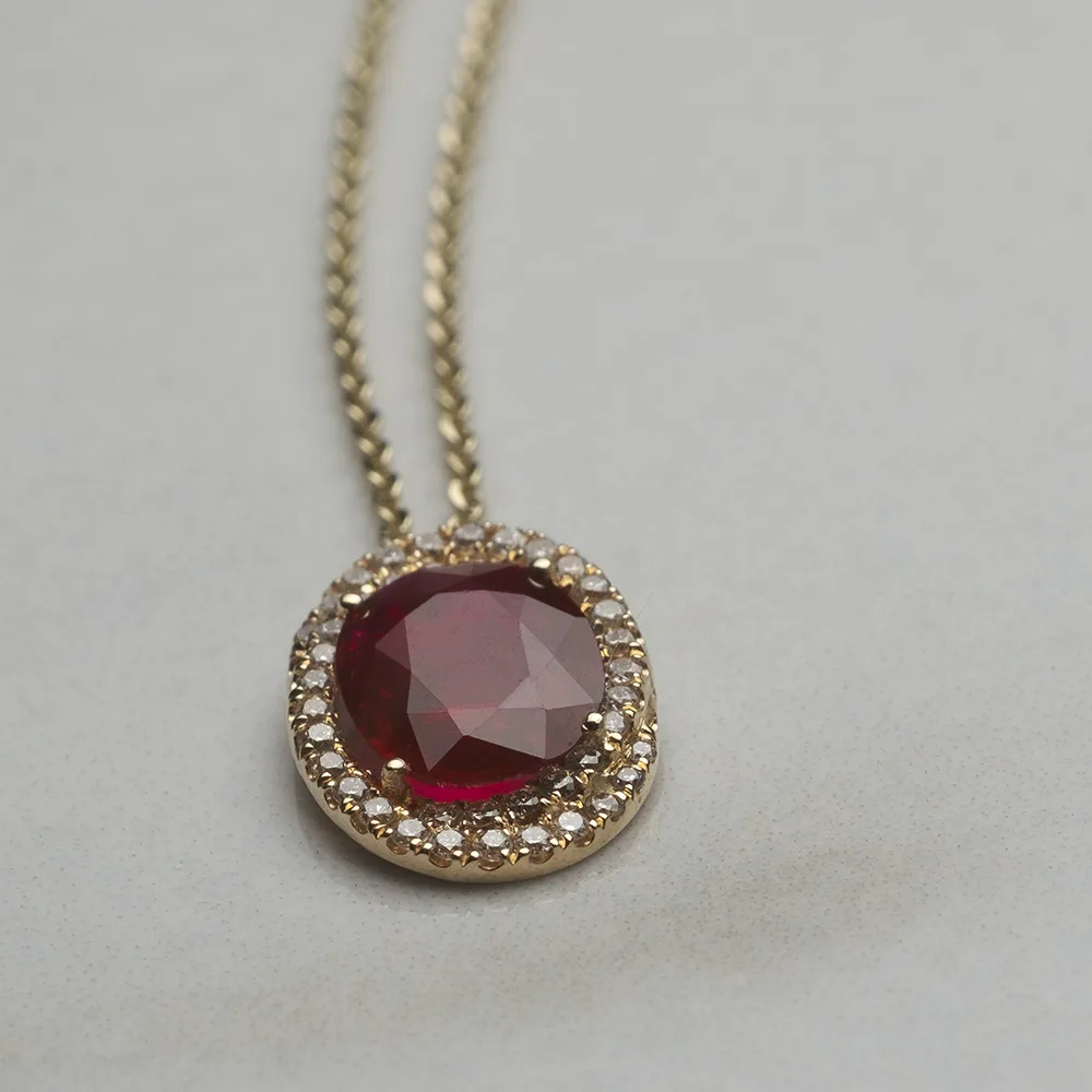 Pendant with rubies in 18k gold — Joyería Liévano